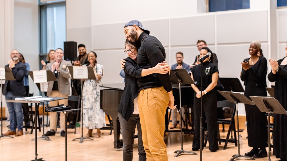Librettist Jessica Murphy Moo and composer Damien Geter embrace at a workshop for Loving v. Virginia, to premiere at Virginia Opera in April 2025. (photo: Sandra Leigh Photography)