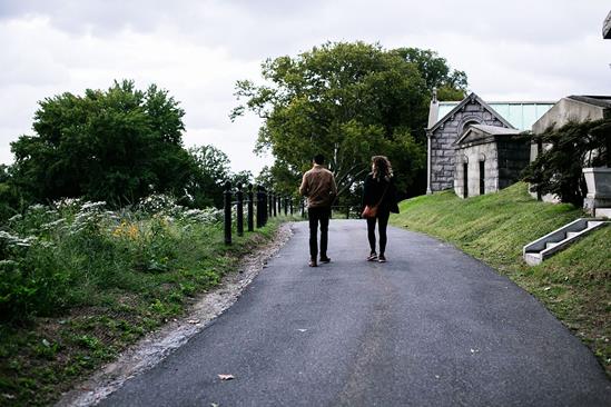 The Angel’s Share attendees stroll through Brooklyn’s Green-Wood Cemetery before the show.