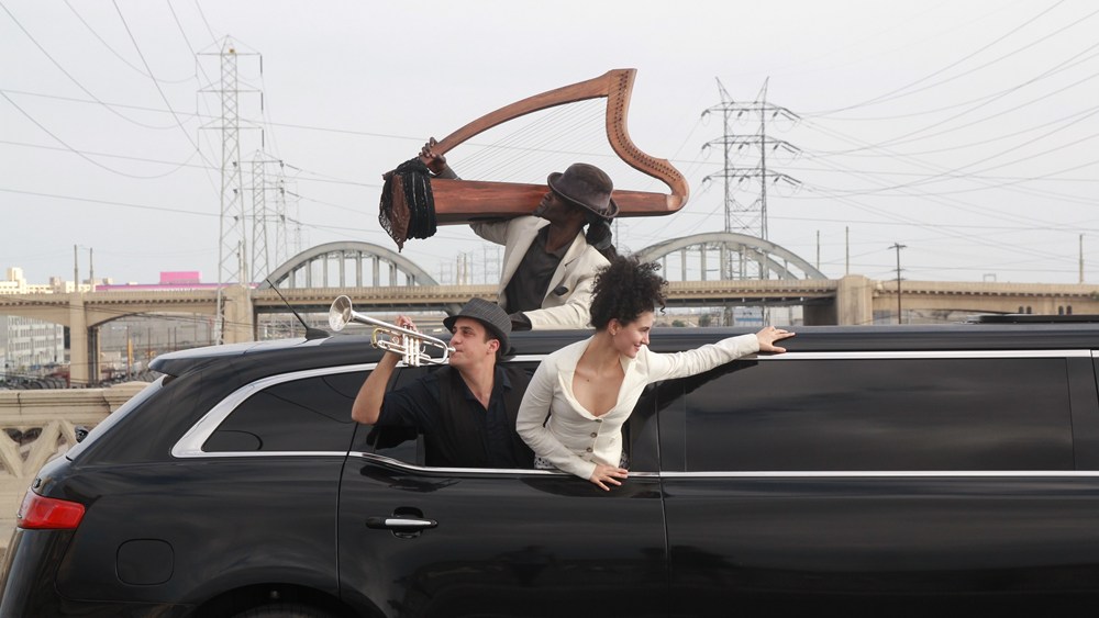 In 2015, The Industry presented Hopscotch in 24 cars that zigzagged across Los Angeles. Pictured: Jonah Levy, Phillip King, and Delaram Kamareh (photo: Dana Ross)