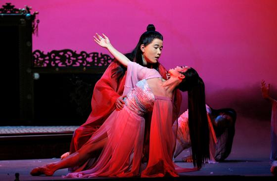 Yijie Shie with a dancer in San Francisco Opera’s world premiere of Dream of the Red Chamber by Bright Sheng and David Henry Hwang
