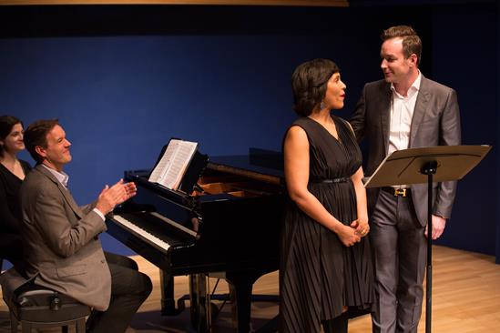 Composer Composer Jake Heggie applauds Talise Travigne and Stephen Costello at an Opera Center event